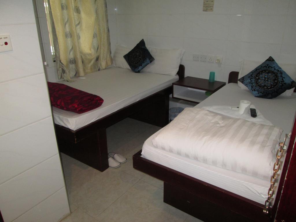 Global Inn Kowloon Stadt Exterior foto